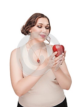 Beautiful plus size woman with apple