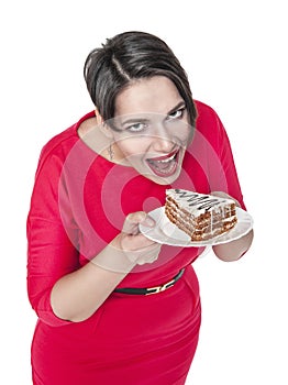 Beautiful plus size woman eating cake