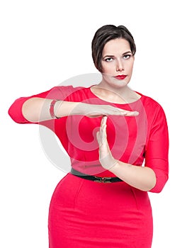Beautiful plus size woman in red dress showing time out gesture