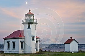 The Beautiful Point Robinson Lighthouse with Mount Rainier in the Backdrop during Sunset