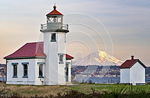 The Beautiful Point Robinson Lighthouse with Mount Rainier in the Backdrop during Sunset