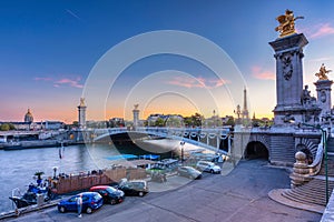 Beautiful Pont Alexandre III bridge over the Seine river at sunset, Paris. France