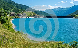 The beautiful Pontechianale Lake on a summer morning. Province of Cuneo, Piedmont, Italy.