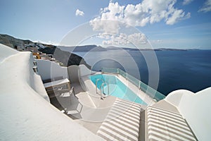 Beautiful pool villa landscape with sea view, white architecture on Santorini island, Greece