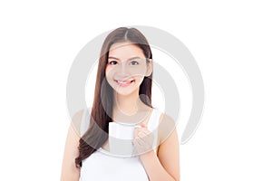 Beautiful portrait asian young woman smiling and drinking water