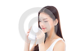 Beautiful portrait asian young woman smiling and drinking water