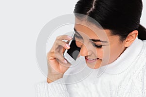 Beautiful portrait of attractive young happy woman with mobile phone with pretty smile, on the white background.