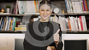 Beautiful, portrait of confident successful businesswoman standing on office background.