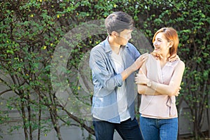 Beautiful portrait couple looking each others eyes and smiling with happy, young asian man and woman relation with love dating