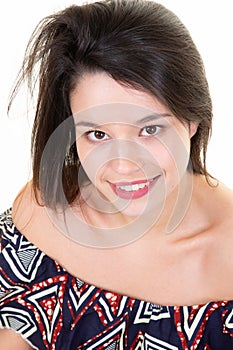 Beautiful portrait pretty young woman in white studio background