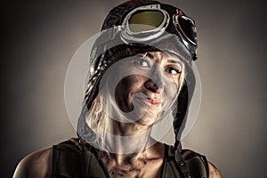 Beautiful portrait woman in helmet with dirty face