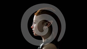 Beautiful portrait of a woman, Side view of the girl. Warm Day Light. Steel armor, Realistic 3d Render model with dark