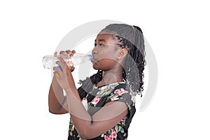 Young African girl with a bottle of mineral water