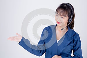 Beautiful portrait young asian business woman customer service call center in headset isolated on white background