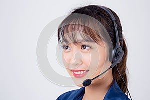 Beautiful portrait young asian business woman customer service job call center in headset isolated on white background