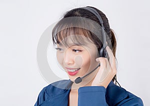 Beautiful portrait young asian business woman customer service job call center in headset isolated on white background