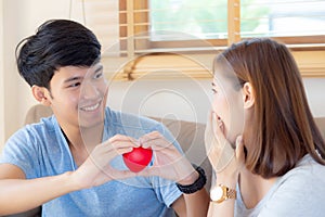 Beautiful portrait young asian couple gesture holding heart shape together