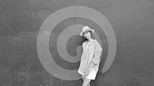 Beautiful portrait of young asian woman. Glamour girl wearing summer clothes. Black and white filter