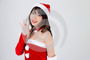 Beautiful portrait young asian woman Santa costume wear hat smiling with happy in holiday xmas