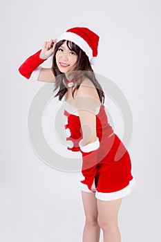 Beautiful portrait young asian woman Santa costume wear hat smiling with happy in holiday xmas