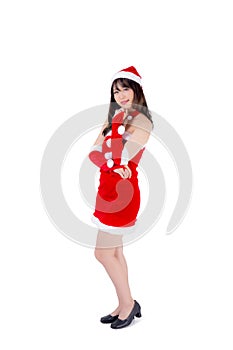 Beautiful portrait young asian woman Santa costume wear hat smiling with happy in holiday xmas