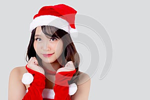 Beautiful portrait young asian woman Santa costume wear hat smiling with happy in holiday xmas.