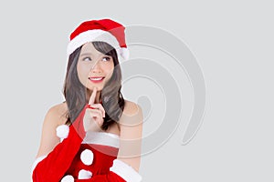 Beautiful portrait young asian woman Santa costume wear hat smiling and thinking in holiday xmas.