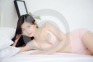 Beautiful portrait young asian woman sexy in underwear figure fit relax with seductive in bedroom