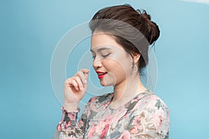 Beautiful portrait young asian woman standing expression serious or doubts with idea, lifestyle concept