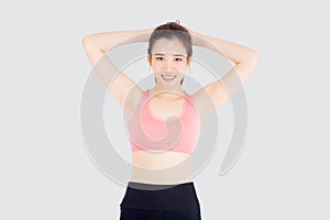 Beautiful portrait young asian woman standing workout stretch muscle arm with healthy isolated on white background