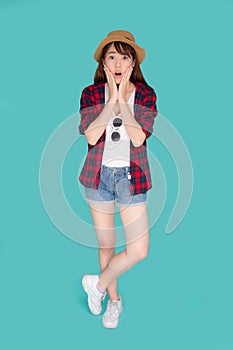 Beautiful portrait young asian woman surprise excited wearing hat having sunglasses to travel summer trip isolated