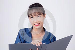 Beautiful portrait young business asian woman cheerful standing holding folder  on white background