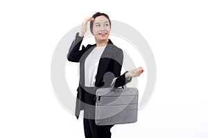 Beautiful portrait young business asian woman holding a briefcase isolated white background.