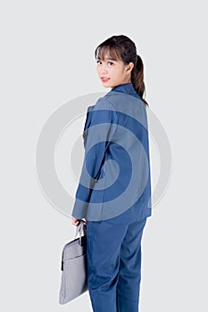 Beautiful portrait young business asian woman holding a briefcase portfolio isolated on white background