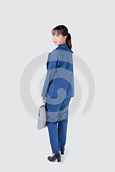 Beautiful portrait young business asian woman holding a briefcase portfolio isolated on white background.