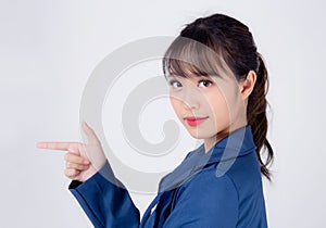 Beautiful portrait young business asian woman standing presenting with confident and smiling isolated