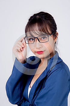 Beautiful portrait young business asian woman standing wearing glasses with confident isolated on white background