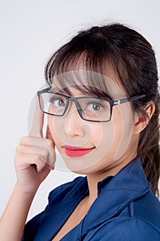 Beautiful portrait young business asian woman standing wearing glasses with confident isolated on white background
