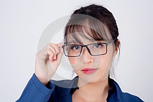 Beautiful portrait young business asian woman standing wearing glasses with confident isolated on white background