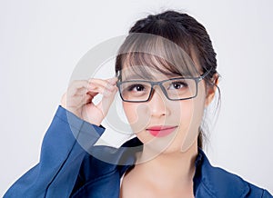 Beautiful portrait young business asian woman standing wearing glasses with confident isolated on white background