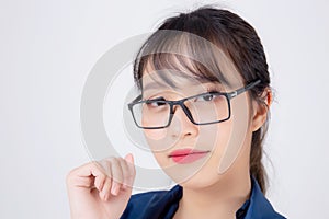 Beautiful portrait young business asian woman standing wearing glasses with confident isolated on white background