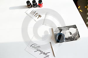 Beautiful postcard with calligraphic inscription of black ink on