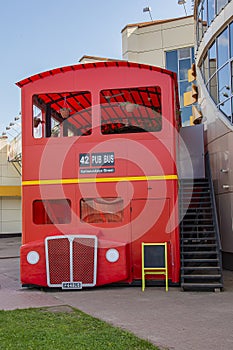 Beautiful practical and convenient bus-pub from England on the streets of Russia