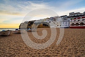 Beautiful Praia de Carvoeiro at sunset in Algarve, Carvoeiro, Portugal photo