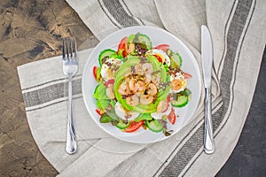 Beautiful prawn salad with cucumber, tomatoes, lettuce, avocado