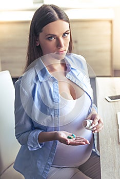 Beautiful pregnant business woman