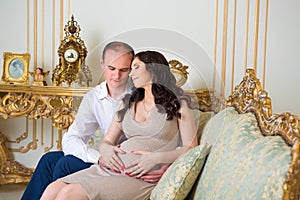 Beautiful pregnant couple expecting baby. Happy couple