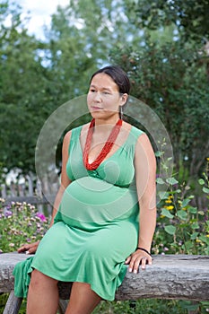 Beautiful pregnant Native American woman