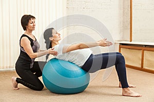 Beautiful pregnant woman doing yoga