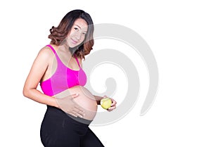 Beautiful pregnant woman with green apple isolated on white